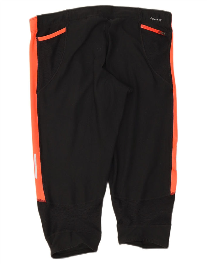 Γυναικεία κολάν Nike Dri Fit Capri UK 12 Medium Black Colourblock
