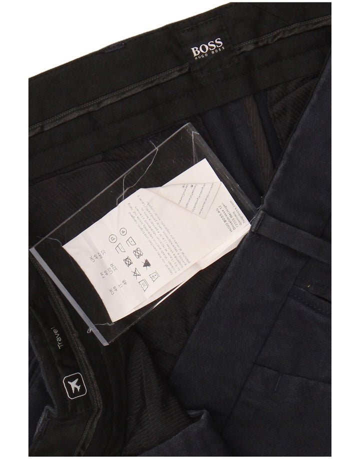 Ανδρικό HUGO BOSS Travel Slim παντελόνι Chino IT 48 Medium W34 L32 Navy Blue