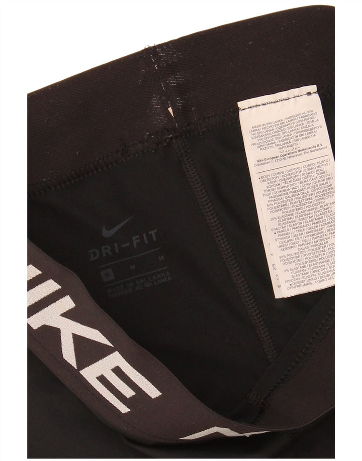 Γυναικεία γραφικά κολάν Capri NIKE UK 12 μεσαίου μαύρου πολυεστέρα