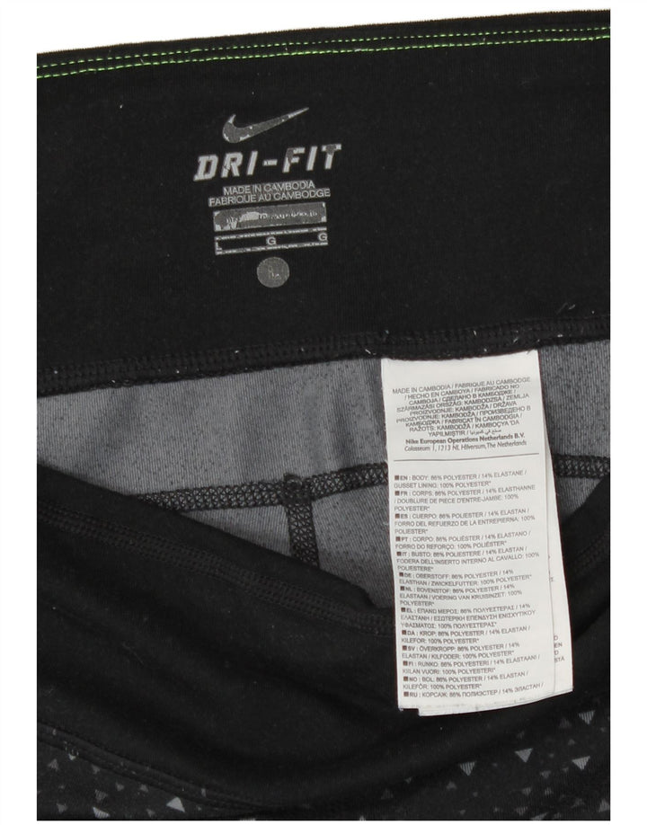Γυναικεία κολάν Nike Dri Fit Capri UK 16 Μεγάλο μαύρο γεωμετρικό πολυεστέρα