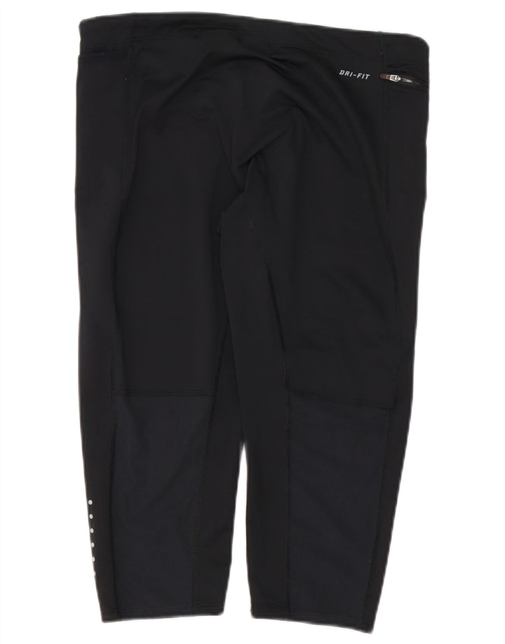 Γυναικείο κολάν Nike Dri Fit Capri UK 14 Μεγάλο μαύρο πολυεστέρα
