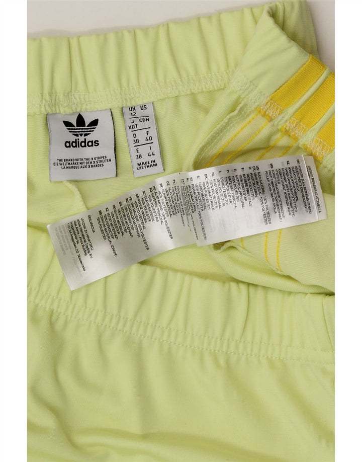 Γυναικείο αθλητικό σορτς Adidas UK 12 μεσαίου κίτρινου πολυεστέρα