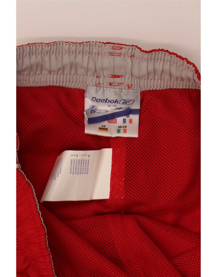 Ανδρική αθλητική φόρμα Reebok Capri Παντελόνι Μικρό κόκκινο