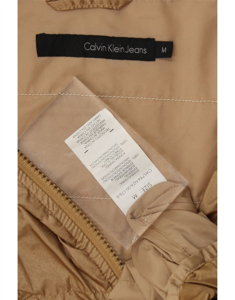 CALVIN KLEIN Womens Loose Fit Rain Jacket UK 14 Medium Gold Nylon Vintage Calvin Klein and Second-Hand Calvin Klein from Messina Hembry 