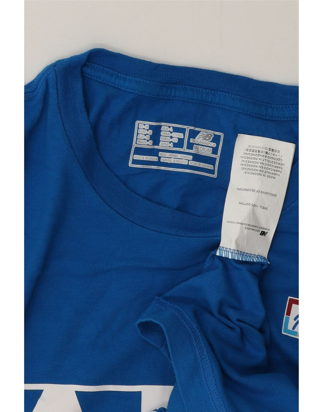 Ανδρικό γραφικό μπλουζάκι NEW BALANCE Τοπ μεσαίο μπλε βαμβακερό