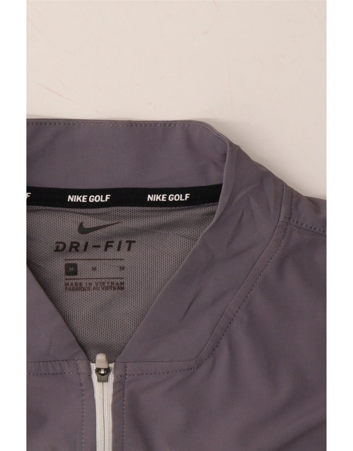 NIKE Mens Dri Fit Tracksuit Top Jacket Medium Purple Polyester Vintage Nike and Second-Hand Nike from Messina Hembry 