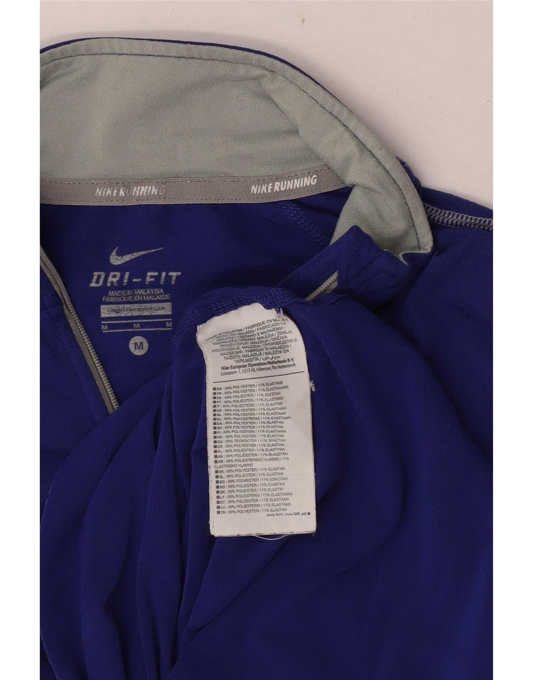 Γυναικεία φόρμα πουλόβερ με φερμουάρ Nike Dri Fit Top UK 12 Medium Blue