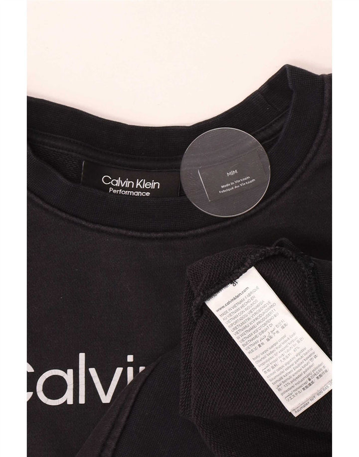 Calvin Klein Γυναικεία φούτερ με γραφικά Crop Jumper UK 14 Medium Navy Blue