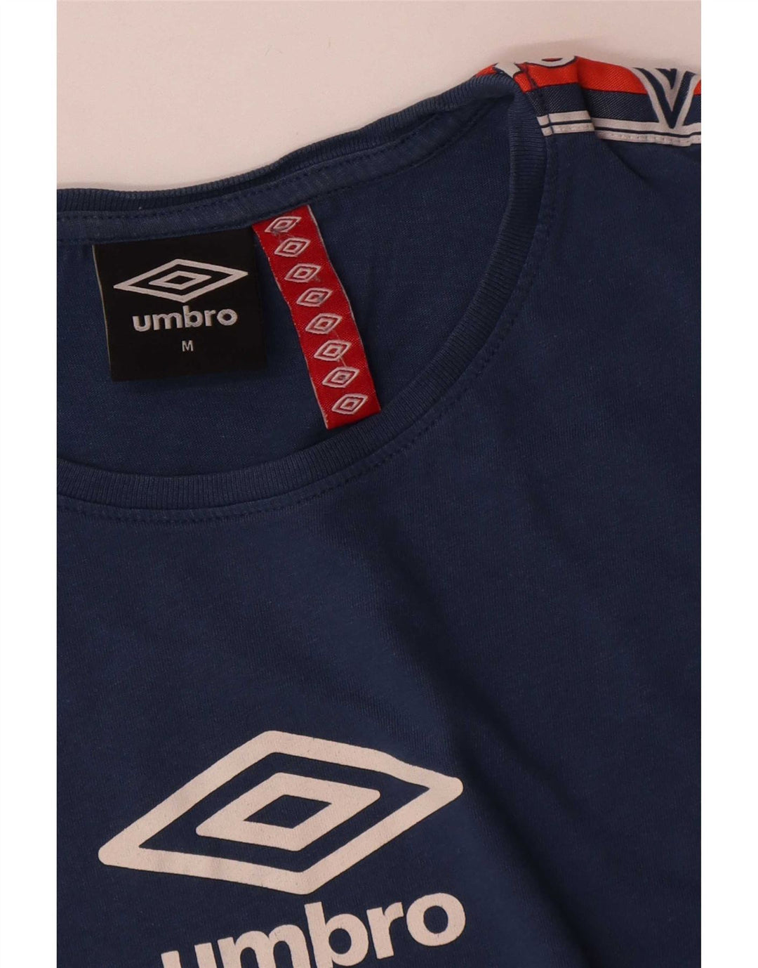 Ανδρικό γραφικό μπλουζάκι Umbro Τοπ μεσαίου μπλε χρώματος βαμβακερό
