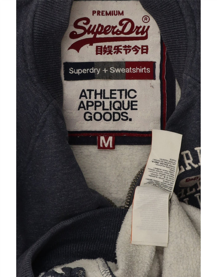 Superdry Ανδρική φόρμα φόρμας με γραφικές φόρμες, Μπουφάν από μεσαίο μπλε ναυτικό βαμβακερό