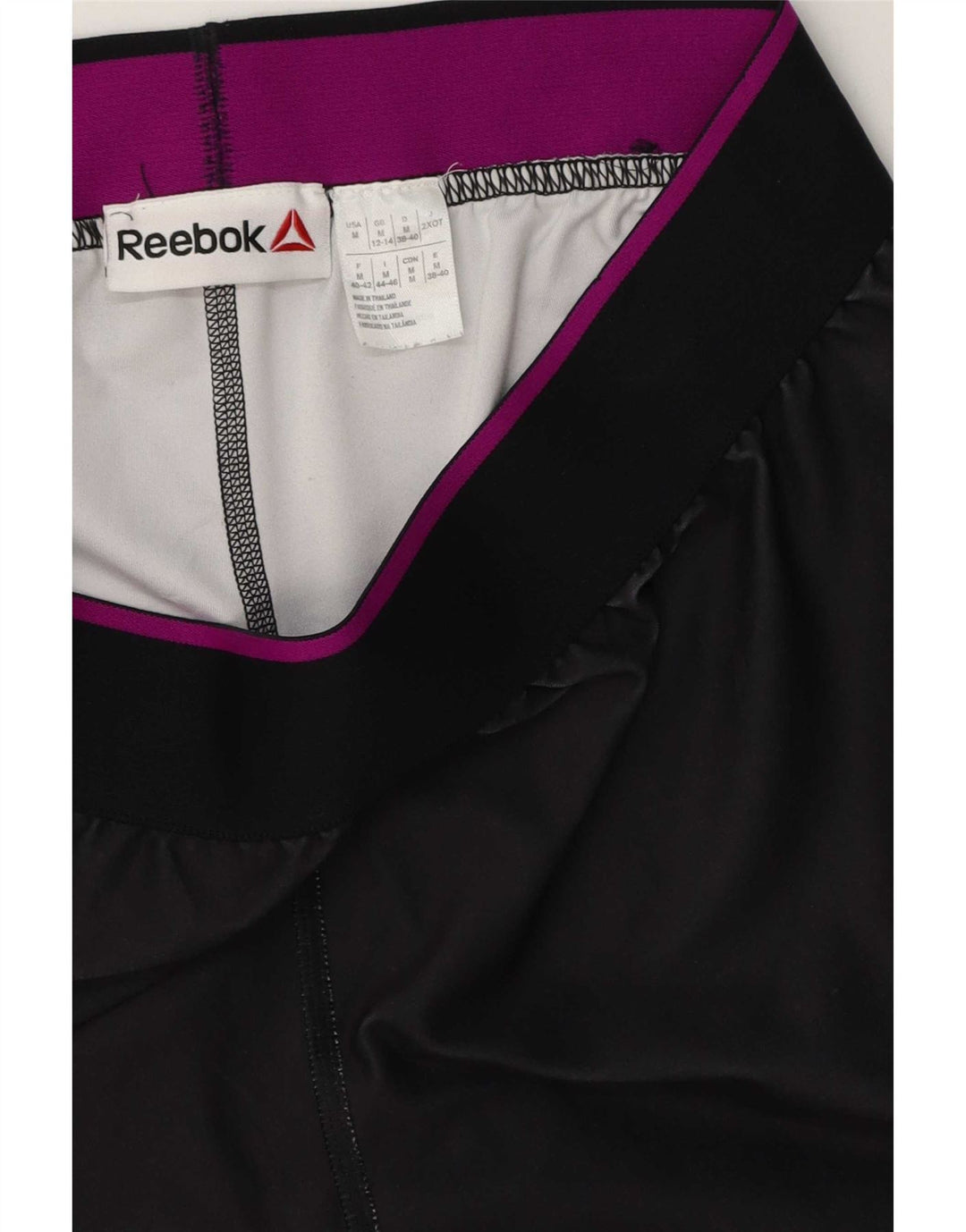 Γυναικεία γραφικά κολάν Reebok UK 12/14 Medium Black Colourblock