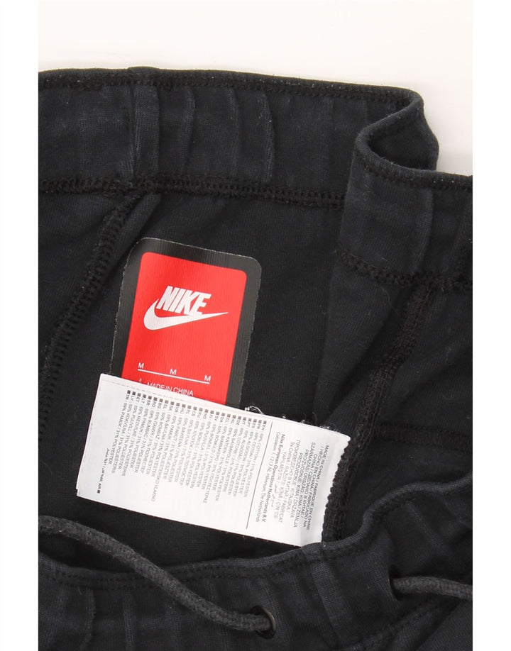 NIKE Mens Graphic Tracksuit Trousers Joggers Medium  Navy Blue Cotton Vintage Nike and Second-Hand Nike from Messina Hembry 