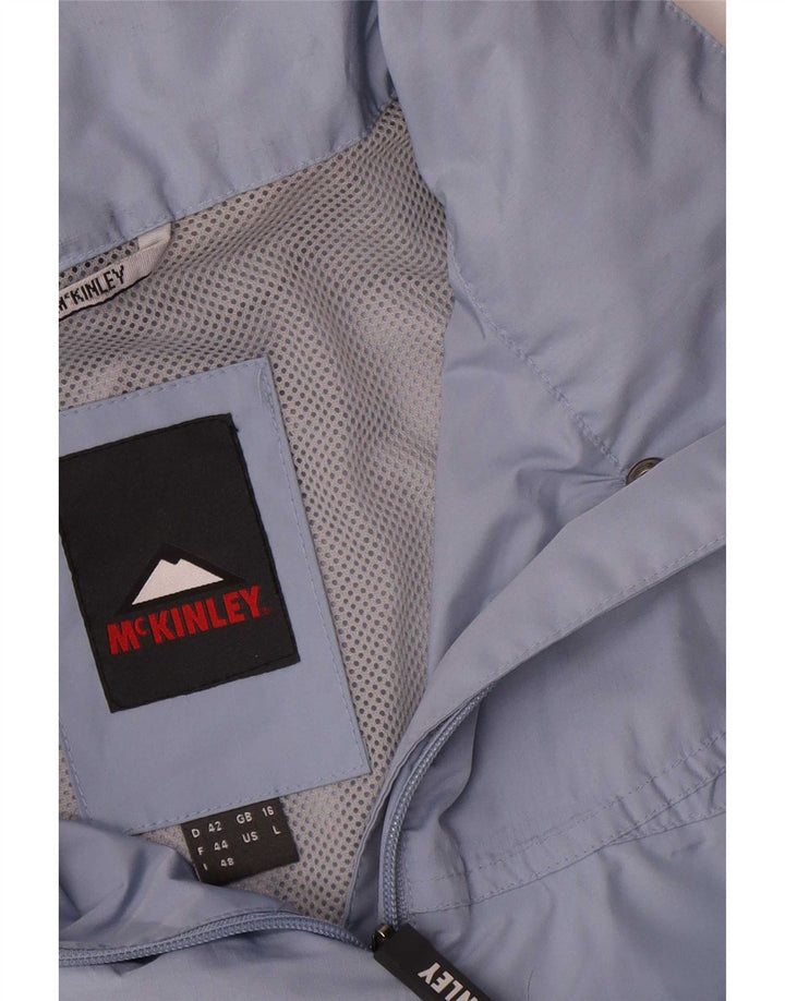 Γυναικείο μπουφάν βροχής MC Kinley UK 16 Large Blue Polyester
