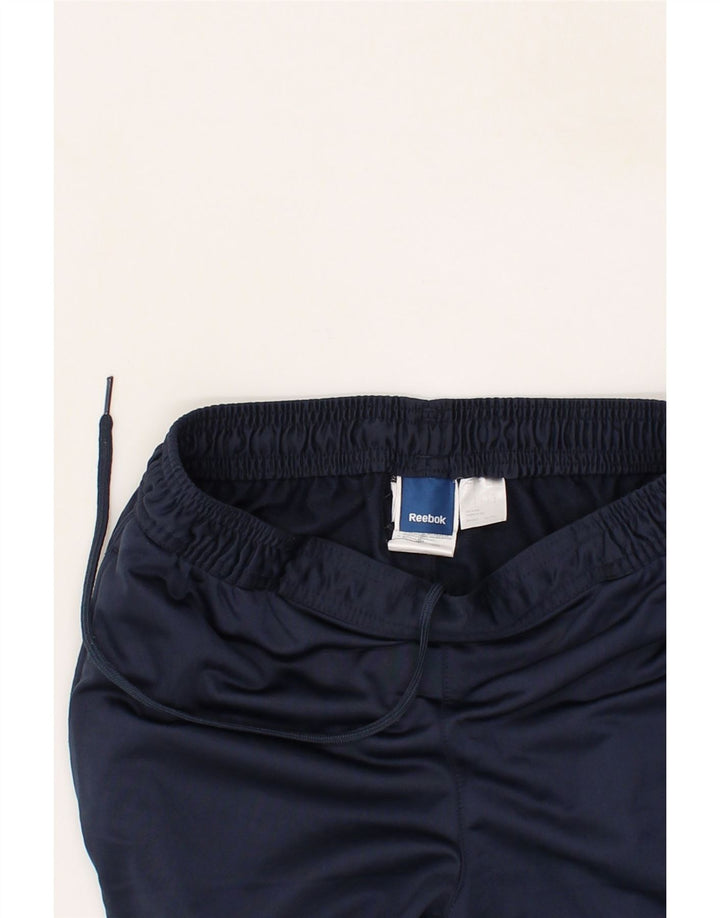 REEBOK Mens Tracksuit Trousers Small  Navy Blue Colourblock Polyester Vintage Reebok and Second-Hand Reebok from Messina Hembry 