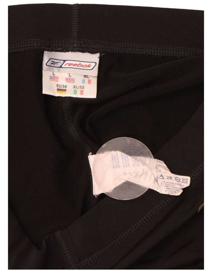 Γυναικείο αθλητικό σορτς Reebok UK 14 μεγάλο μαύρο πολυεστέρα