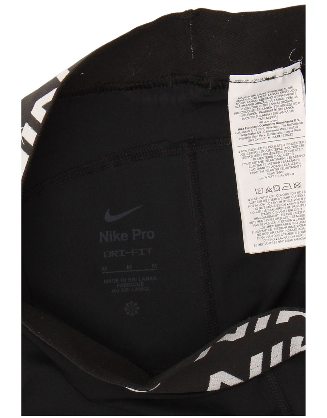Γυναικεία γραφικά κολάν NIKE Dri Fit UK 12 μεσαίου μαύρου πολυεστέρα