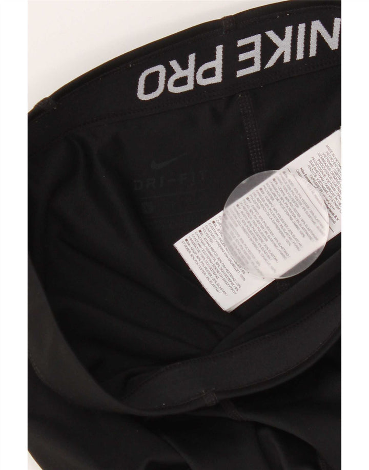 Γυναικεία κολάν Nike Capri Graphic UK 8 Small Black Polyester