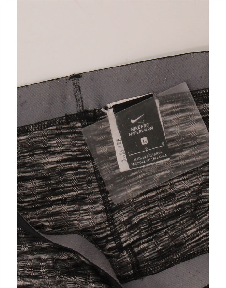 Γυναικεία γραφικά κολάν NIKE UK 14 Large μαύρο ριγέ πολυεστέρα