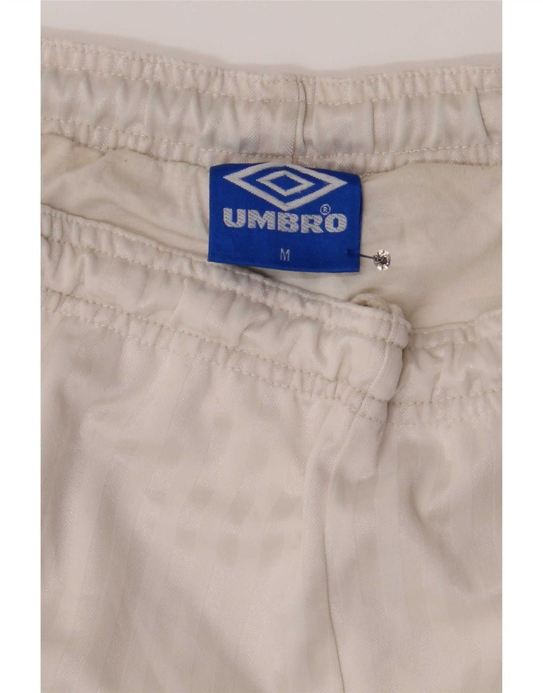 Ανδρικό αθλητικό σορτς Umbro σε μεσαίο λευκό χρώμα, πολυεστέρας
