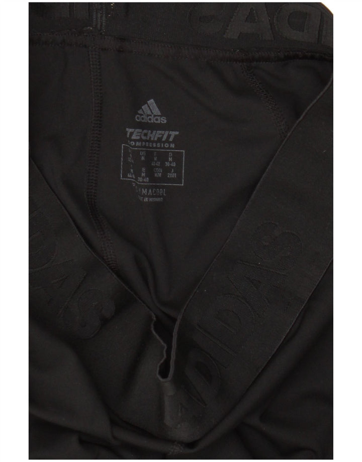 Γυναικεία γραφικά κολάν Adidas UK 12/14 Medium Black