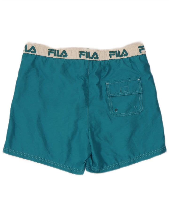 Ανδρικό γραφικό σορτς κολύμβησης Fila με μεσαίο μπλε χρώμα πολυεστέρα