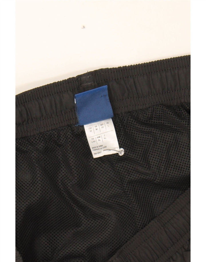 REEBOK Mens Tracksuit Trousers Joggers Medium Black Polyester Vintage Reebok and Second-Hand Reebok from Messina Hembry 