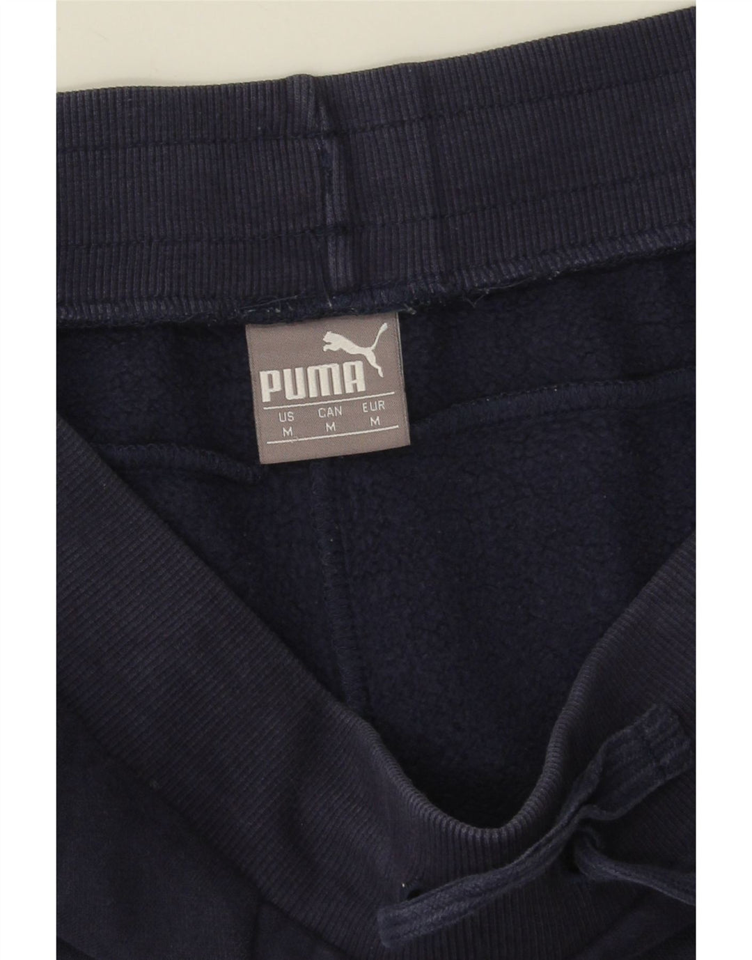 Ανδρική φόρμα γραφικής Puma Παντελόνι Joggers Medium Navy Blue Βαμβακερό