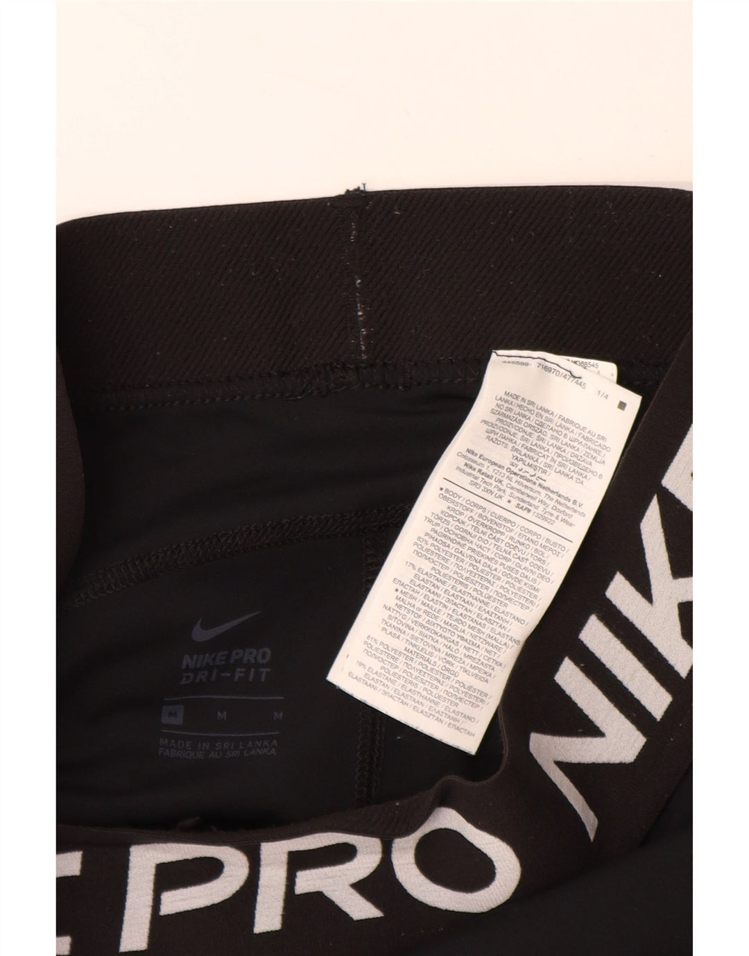 NIKE Womens Dri Fit Graphic Capri Leggings UK 12 Medium  Black Polyester