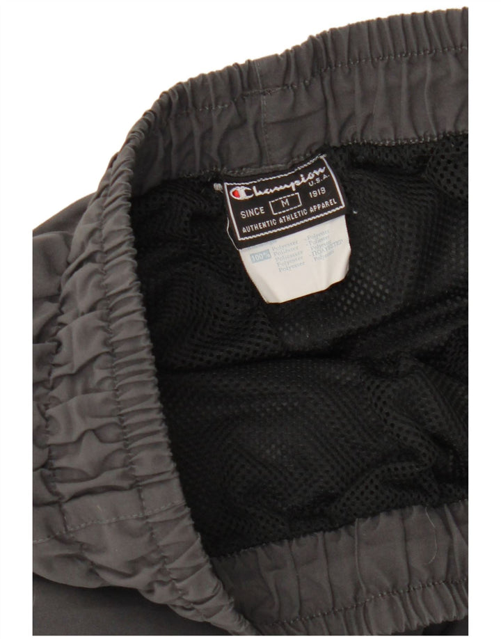 Ανδρική αθλητική φόρμα Champion Graphic Παντελόνι Μεσαίο Μαύρο Πολυεστέρα