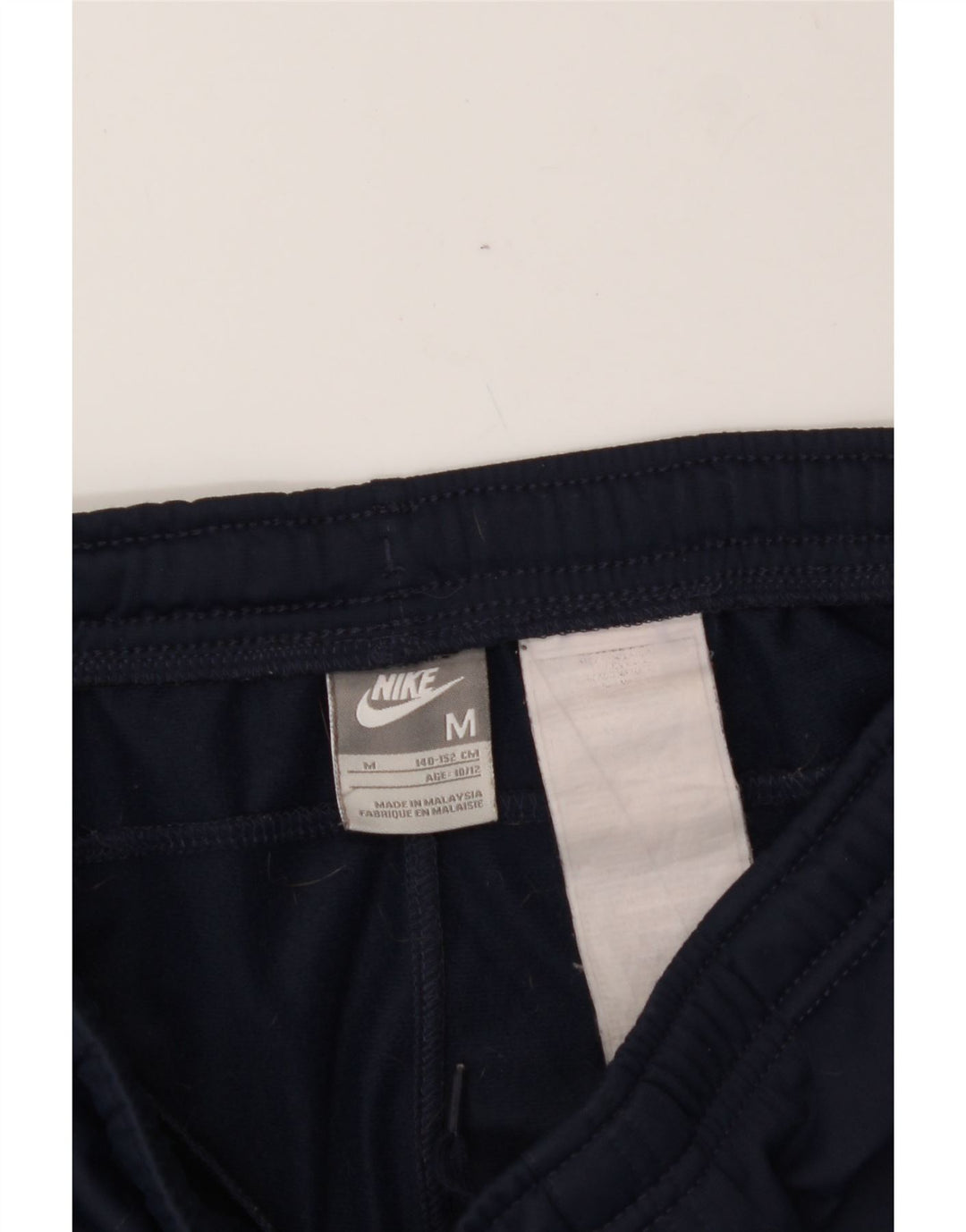 NIKE Boys Tracksuit Trousers 10-11 Years Medium Navy Blue Vintage Nike and Second-Hand Nike from Messina Hembry 