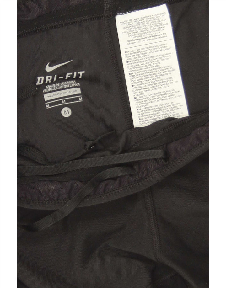 Γυναικεία κολάν Nike Dri Fit Capri UK 12 Medium Black Colourblock