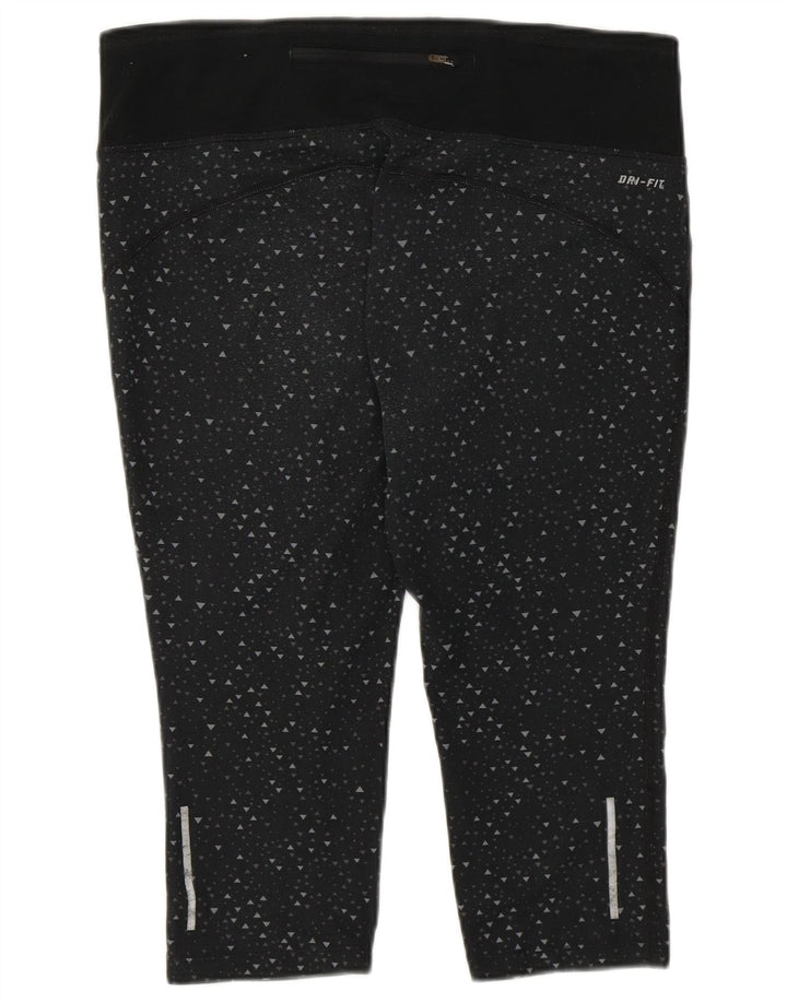 Γυναικεία κολάν Nike Dri Fit Capri UK 16 Μεγάλο μαύρο γεωμετρικό πολυεστέρα