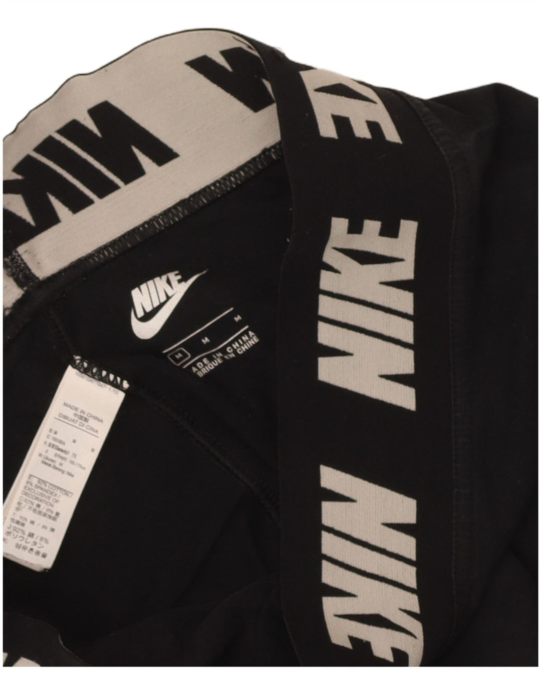 Γυναικεία γραφικά κολάν Nike UK 12 μεσαίο μαύρο βαμβακερό