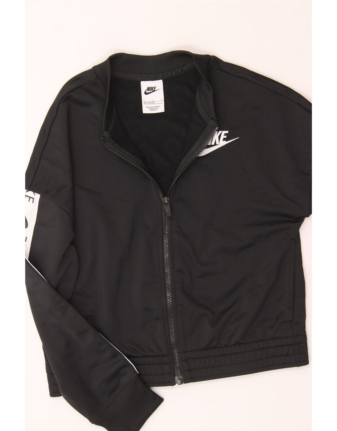 NIKE Boys Graphic Tracksuit Top Jacket 12-13 Years Large Black Polyester Vintage Nike and Second-Hand Nike from Messina Hembry 