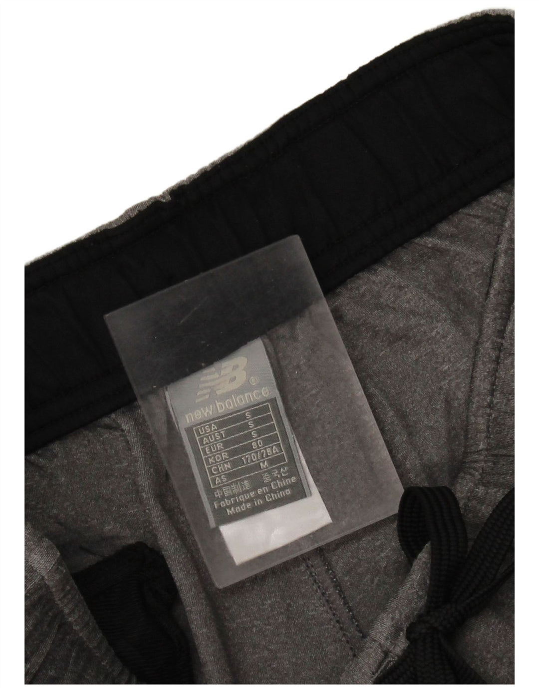 Ανδρική αθλητική φόρμα New Balance Παντελόνι Μικρό Γκρι Πολυεστέρας