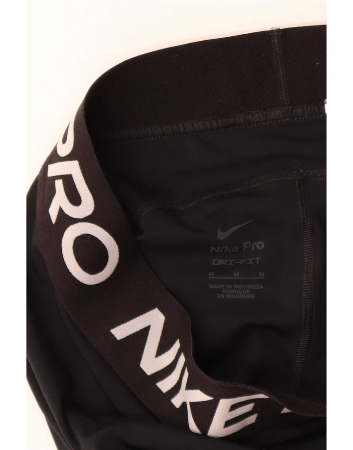 Γυναικεία κολάν Nike Dri Fit Graphic UK 12 Medium Black