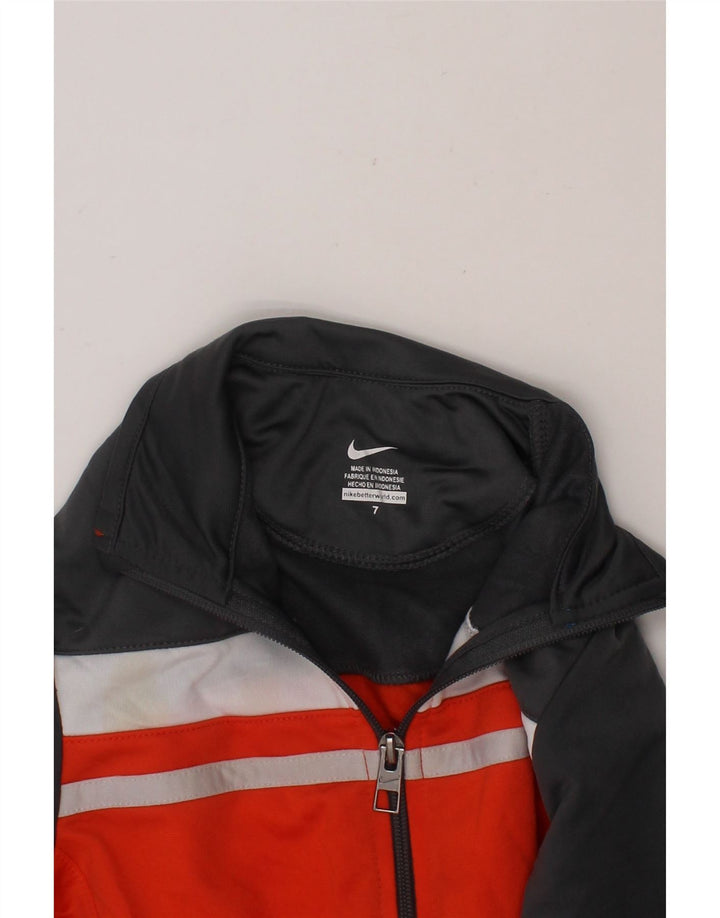 NIKE Boys Tracksuit Top Jacket 6-7 Years Red Colourblock Polyester Vintage Nike and Second-Hand Nike from Messina Hembry 