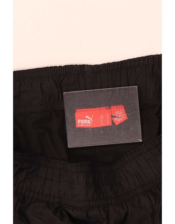 Puma Γυναικείο αδιάβροχο παντελόνι UK 12 Medium Black