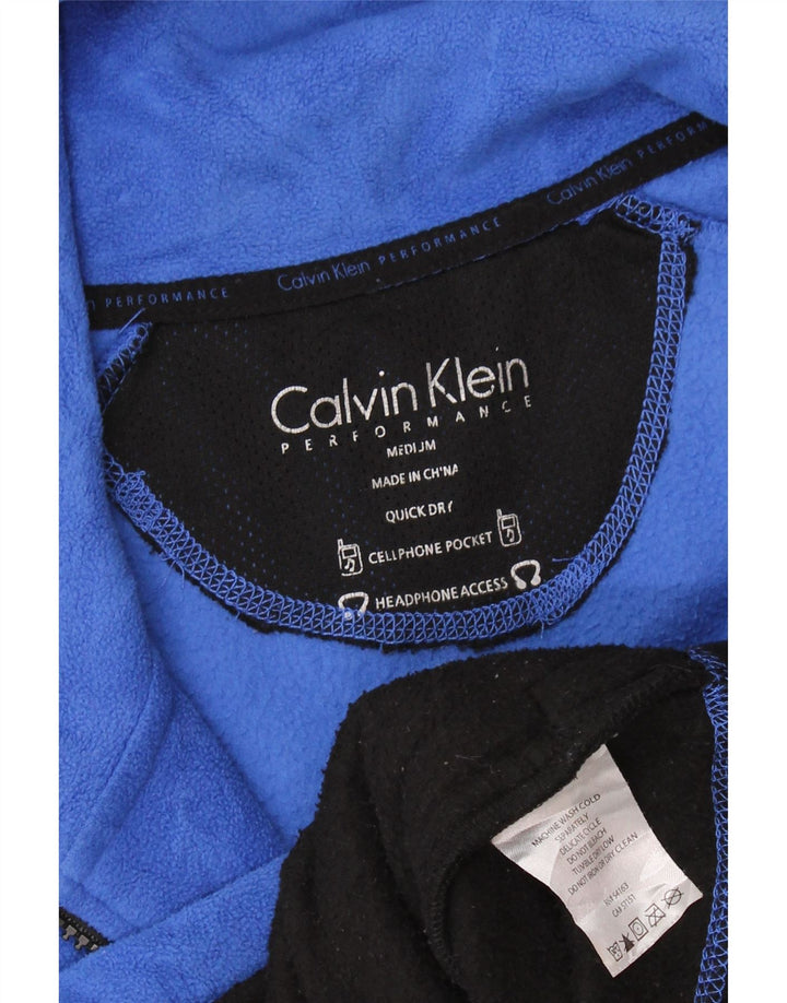 Calvin Klein Γυναικείο τζάκετ με γραφικά φλις UK 14 Medium Blue Colourblock