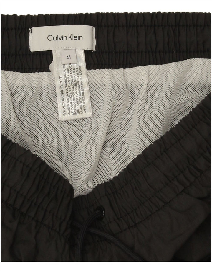 Ανδρικό σορτς κολύμβησης Calvin Klein, μεσαίο μαύρο πολυεστέρα
