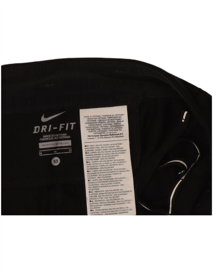 Γυναικείο κολάν NIKE Dri Fit Capri UK 12 μεσαίο μαύρο πολυεστέρα