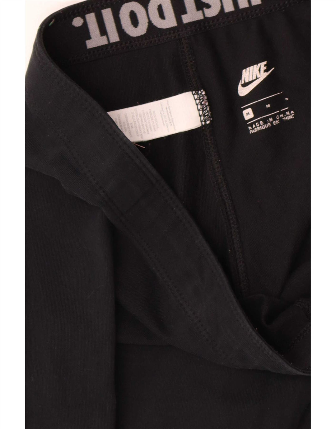 Γυναικεία γραφικά κολάν Nike UK 12 μεσαίο μαύρο βαμβακερό