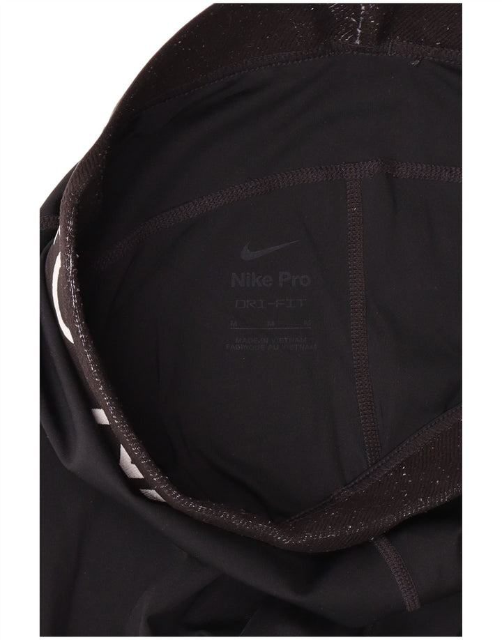 Γυναικεία κολάν Nike Dri Fit Graphic UK 12 Αθλήματα μεσαίου μαύρου πολυεστέρα