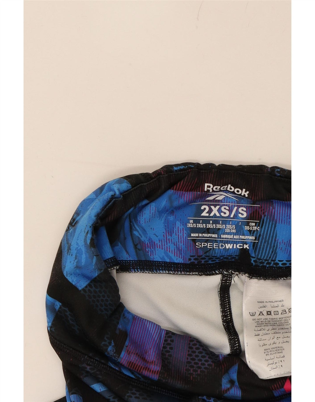 REEBOK Womens Graphic Leggings UK 2 2XS  Blue Geometric Polyester Vintage Reebok and Second-Hand Reebok from Messina Hembry 