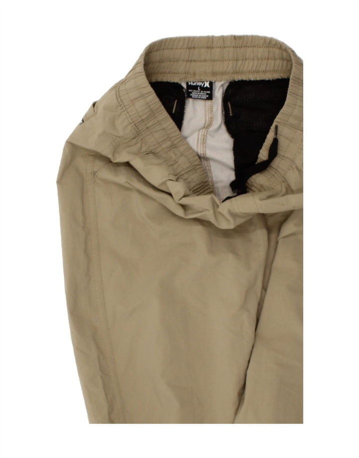 HURLEY Boys Tracksuit Trousers Joggers 12-13 Years Large Beige Polyester Vintage Hurley and Second-Hand Hurley from Messina Hembry 