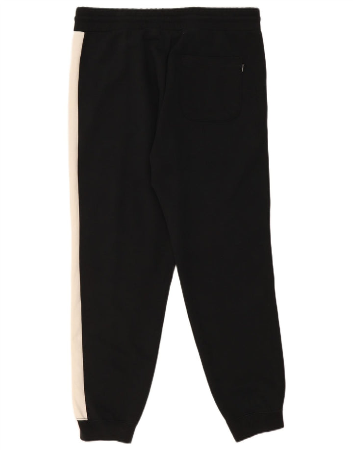 Ανδρική αθλητική φόρμα Converse Παντελόνι Joggers Μεσαίο Μαύρο Colourblock Πολυεστέρας