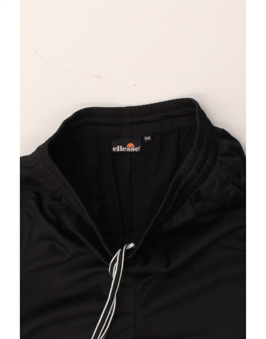 ELLESSE Boys Tracksuit Trousers 13-14 Years Black Polyester Vintage Ellesse and Second-Hand Ellesse from Messina Hembry 