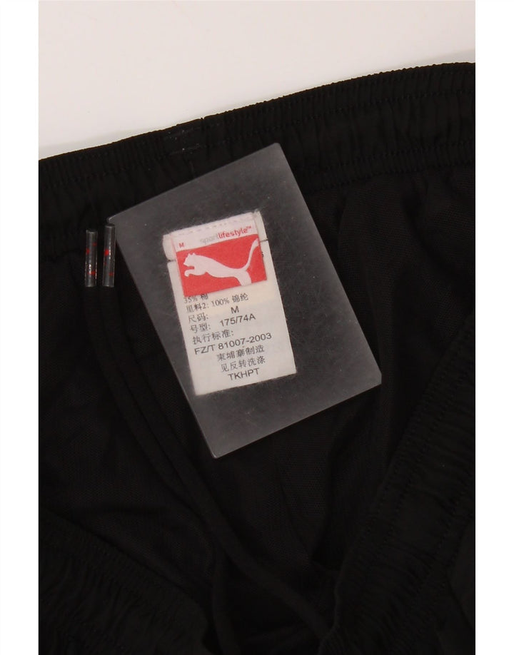 Puma Γυναικεία φόρμα παντελόνι Joggers UK 12 Medium Black