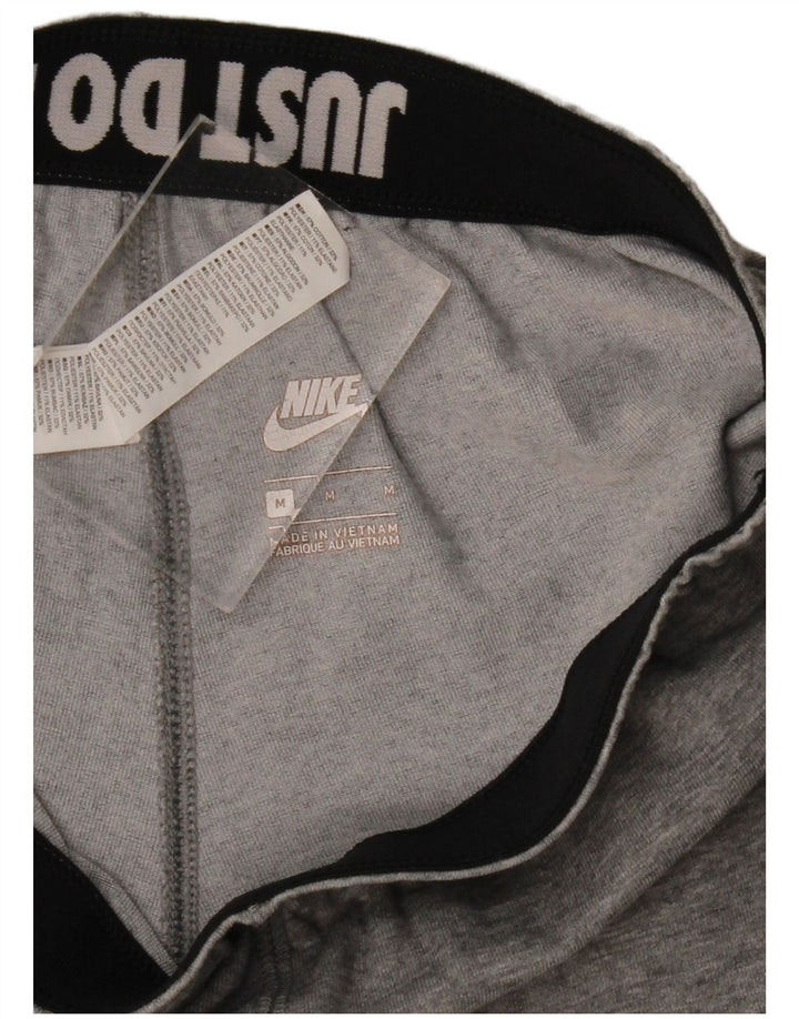 Γυναικεία γραφικά κολάν Nike UK 12 Βαμβακερά μεσαίου γκρι