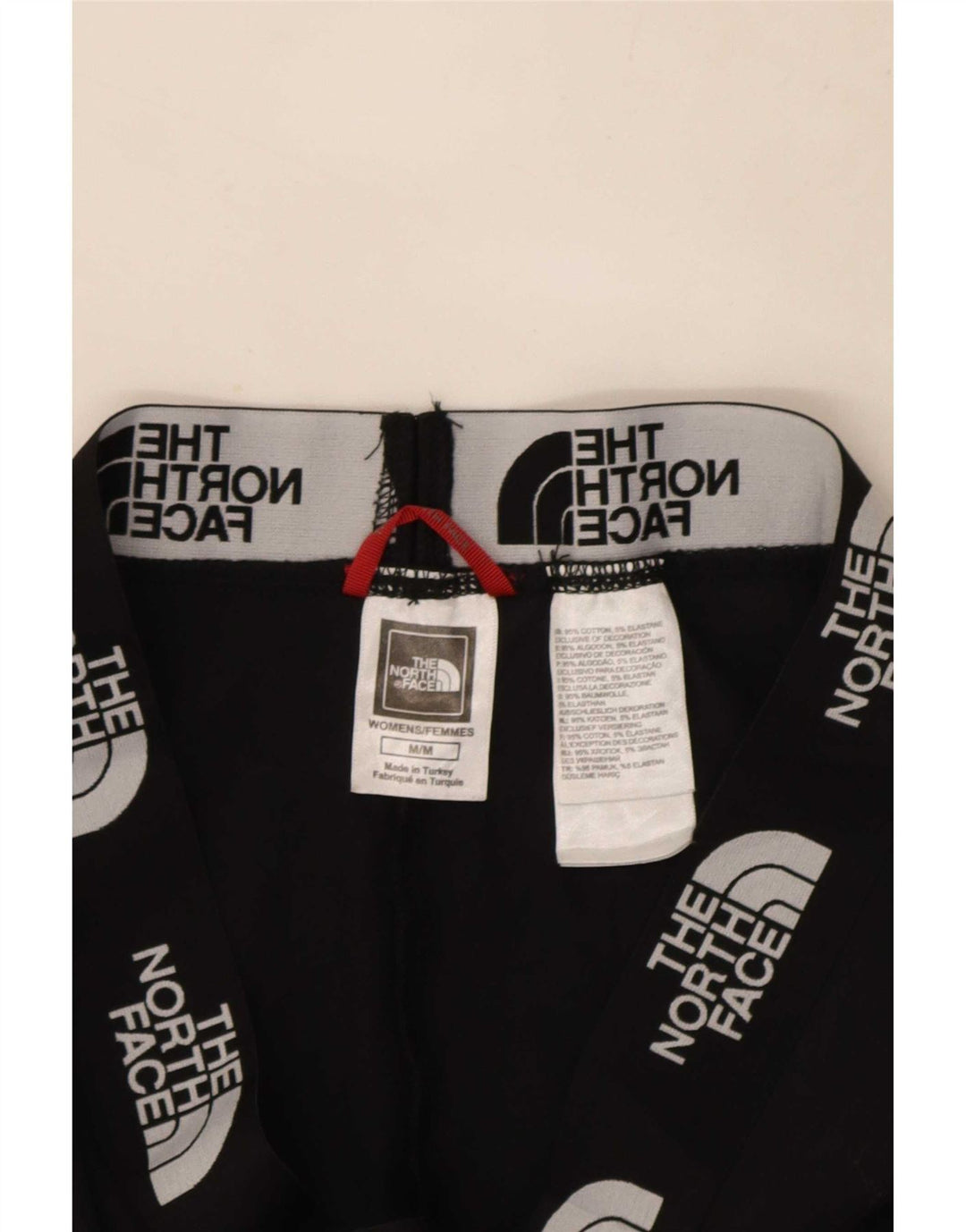 Γυναικείο γραφικό κολάν North Face UK 12 Μεσαίο μαύρο βαμβακερό